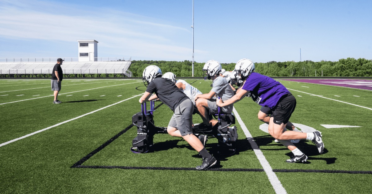 The Physics Behind Sled Training for Football Players